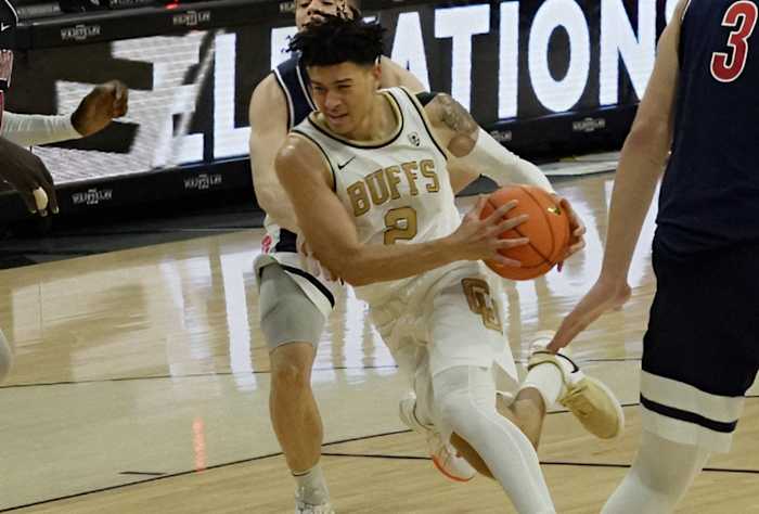 KJ Simpson driving to basketball vs. Arizona